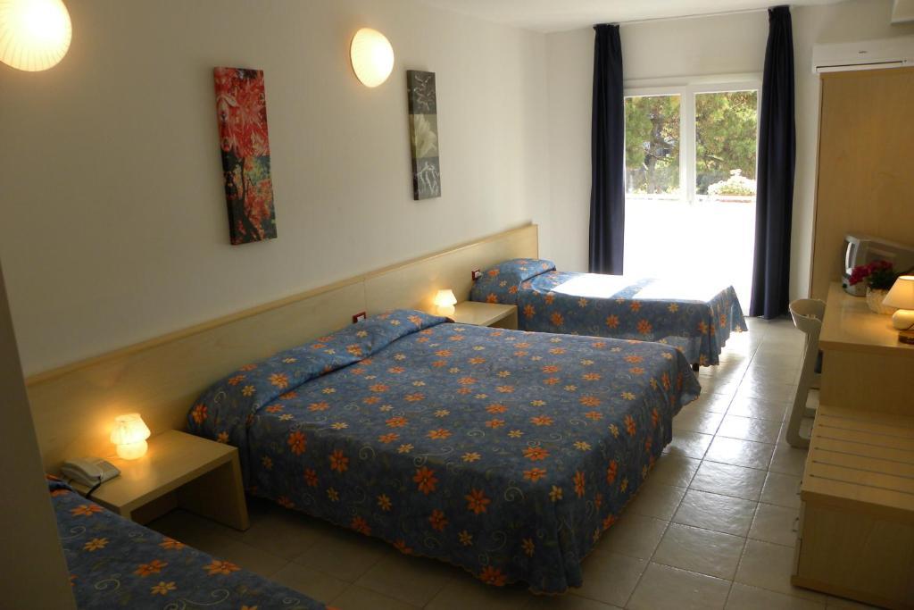 Hotel Santa Cruz Lignano Sabbiadoro Quarto foto